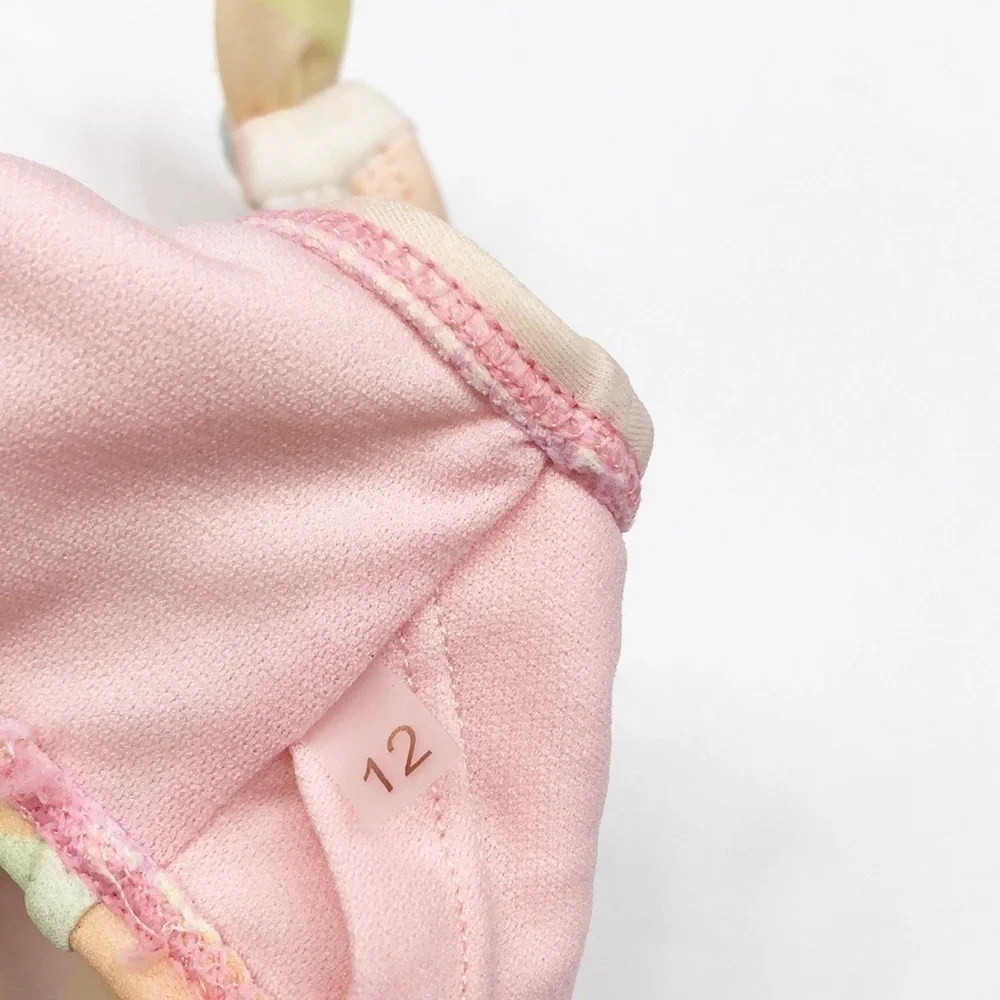 Pastel geometric print swim top for girls